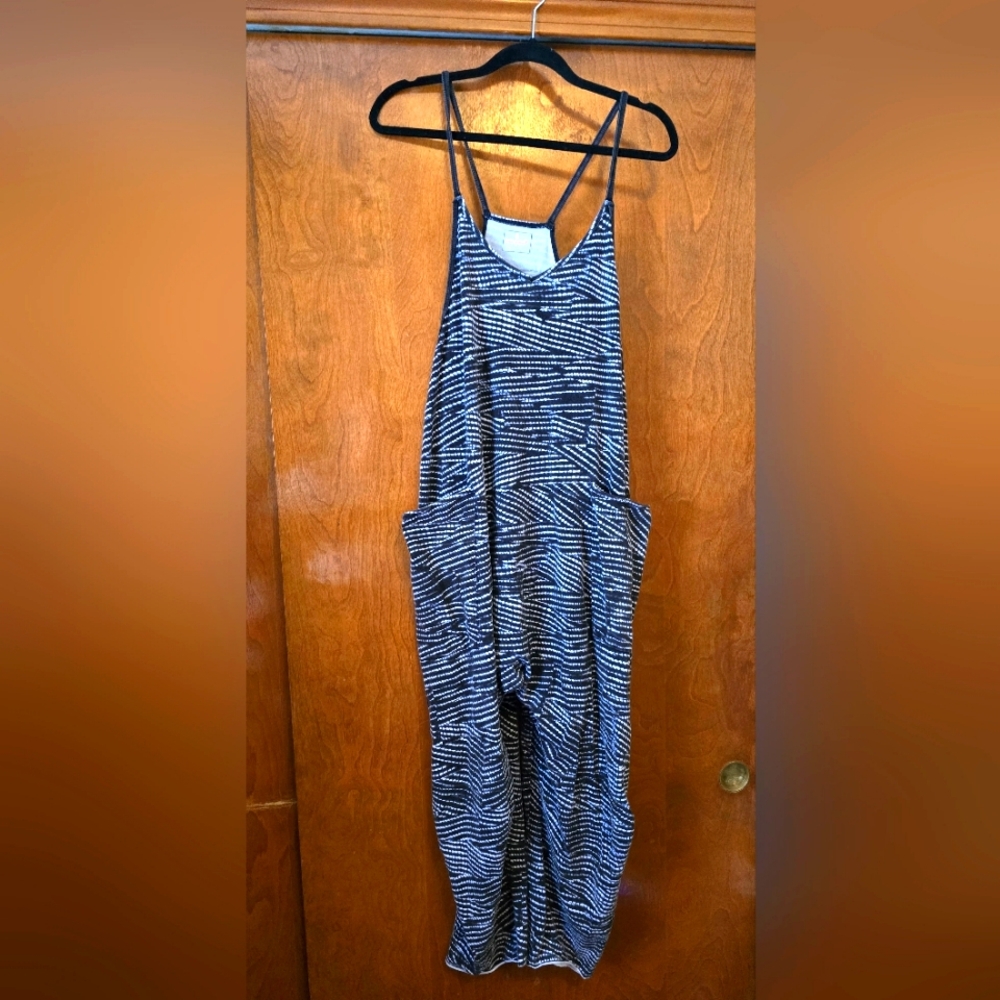 Free people Movement Hot Shot onesie Size Med. black and white rare cool print